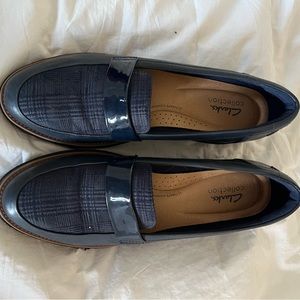 Women’s plaid and navy Clark’s wedge loafers